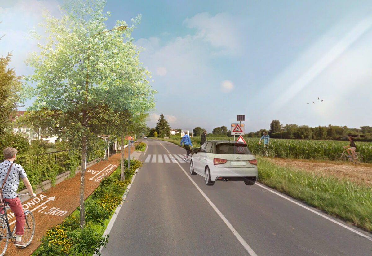 street with car, cycle path, fields