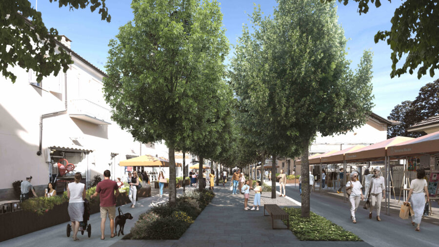 A shaded avenue, people strolling, shops and restaurants at the side