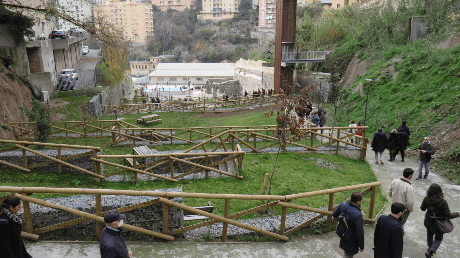 A steep green park with pathways